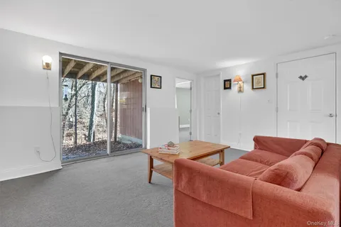 a kitchen with cabinets and white appliances