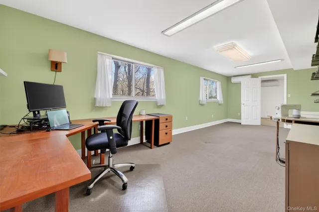 a bathroom with a sink toilet and a mirror