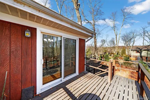a view of a brick building next to a yard