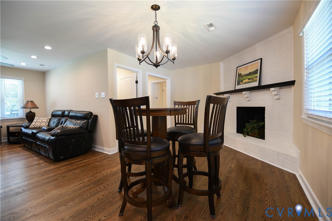 1448 Canterbury Road St. Stephens Church, VA 23148 - Photo 4 of 57 Open-concept living area featuring rich hardwood f