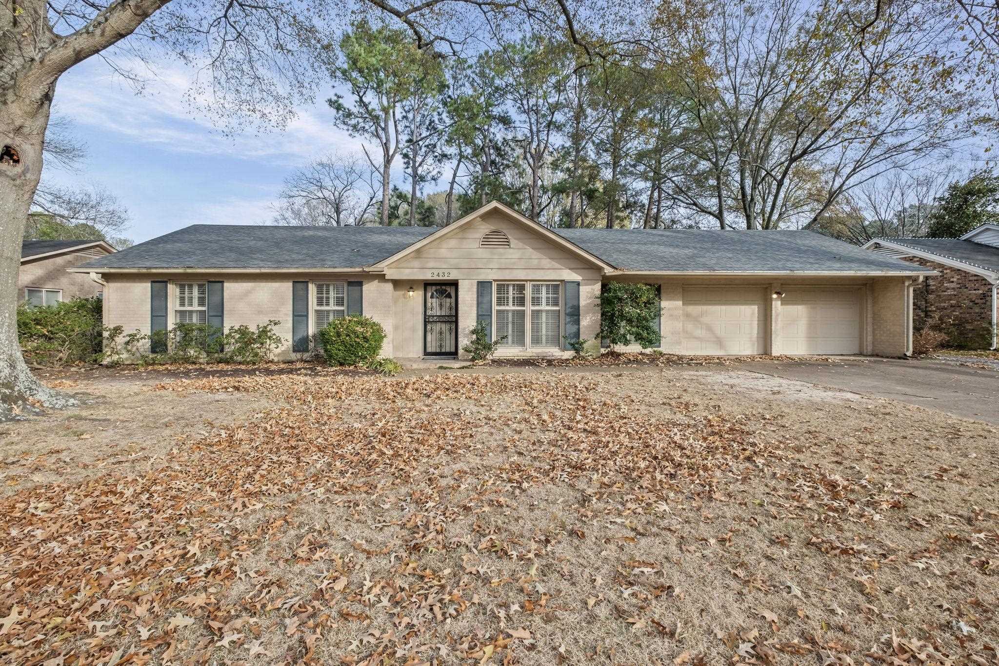 2432 Hawkhurst Street Memphis, TN 38119 - Photo 1 of 31 a front view of a house with a garden