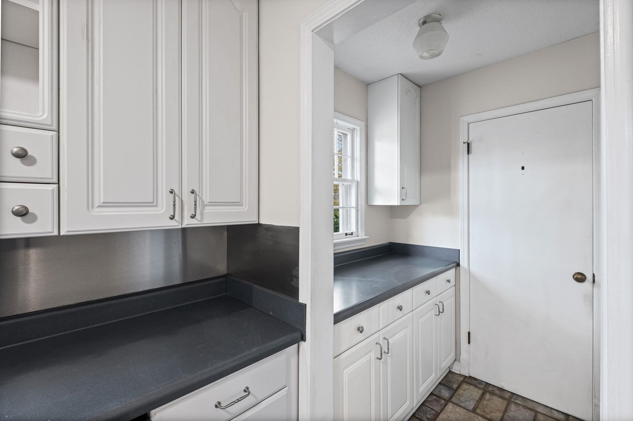 2432 Hawkhurst Street Memphis, TN 38119 - Photo 13 of 31 a view of cabinets and window