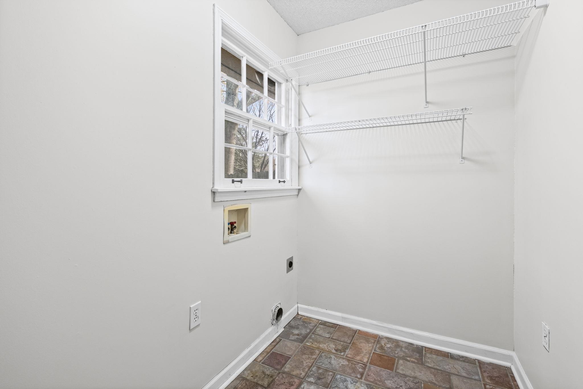 2432 Hawkhurst Street Memphis, TN 38119 - Photo 14 of 31 a view of a room with rack on the wall