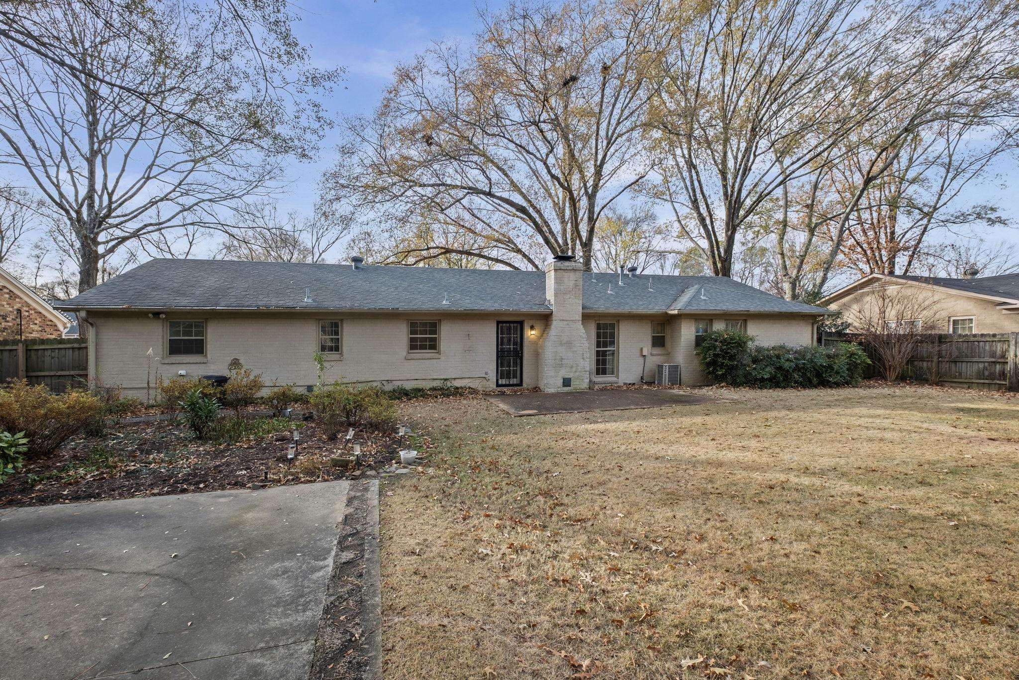 2432 Hawkhurst Street Memphis, TN 38119 - Photo 26 of 31 a front view of house with yard space and trees around