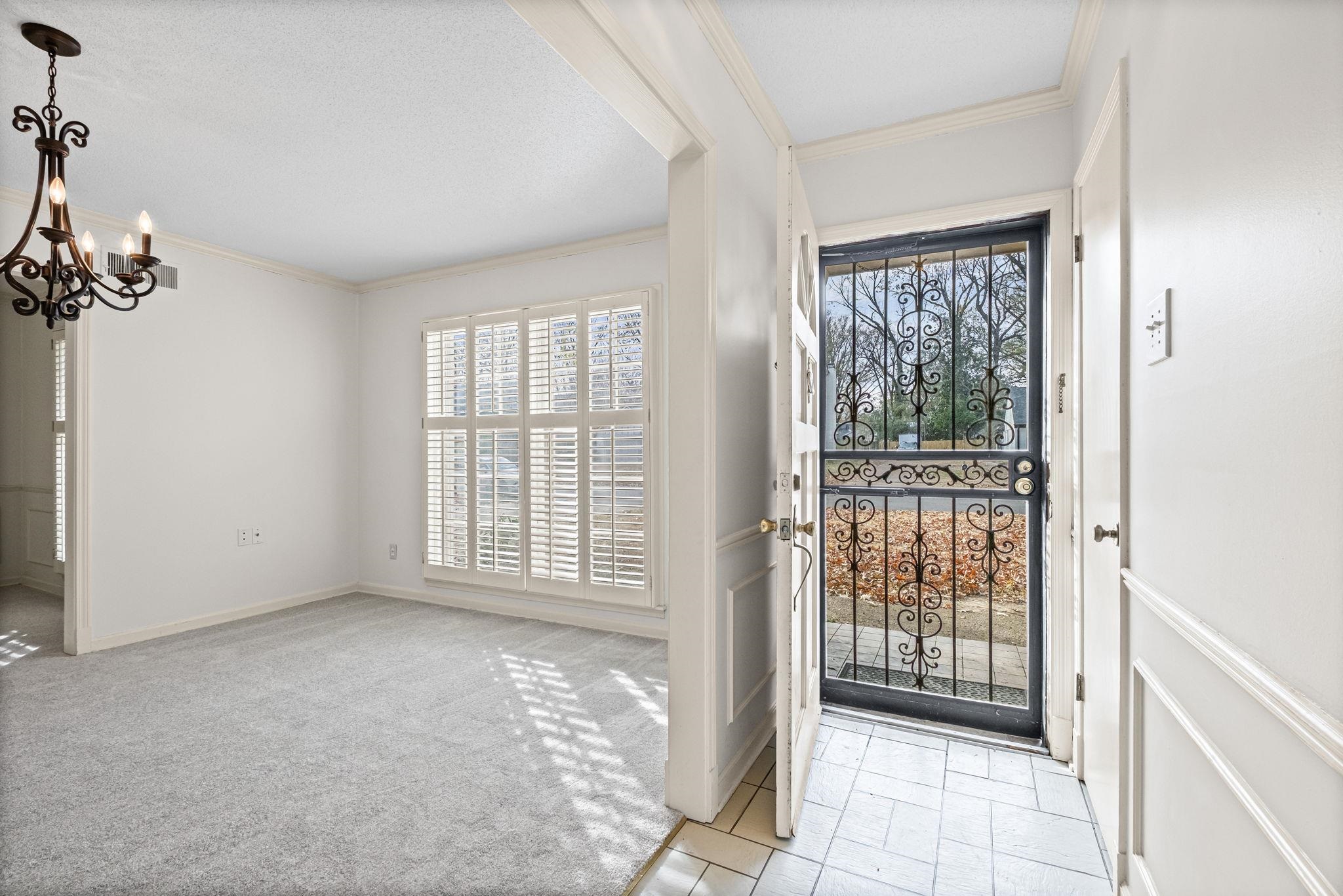 2432 Hawkhurst Street Memphis, TN 38119 - Photo 3 of 31 a view of an empty room with glass door