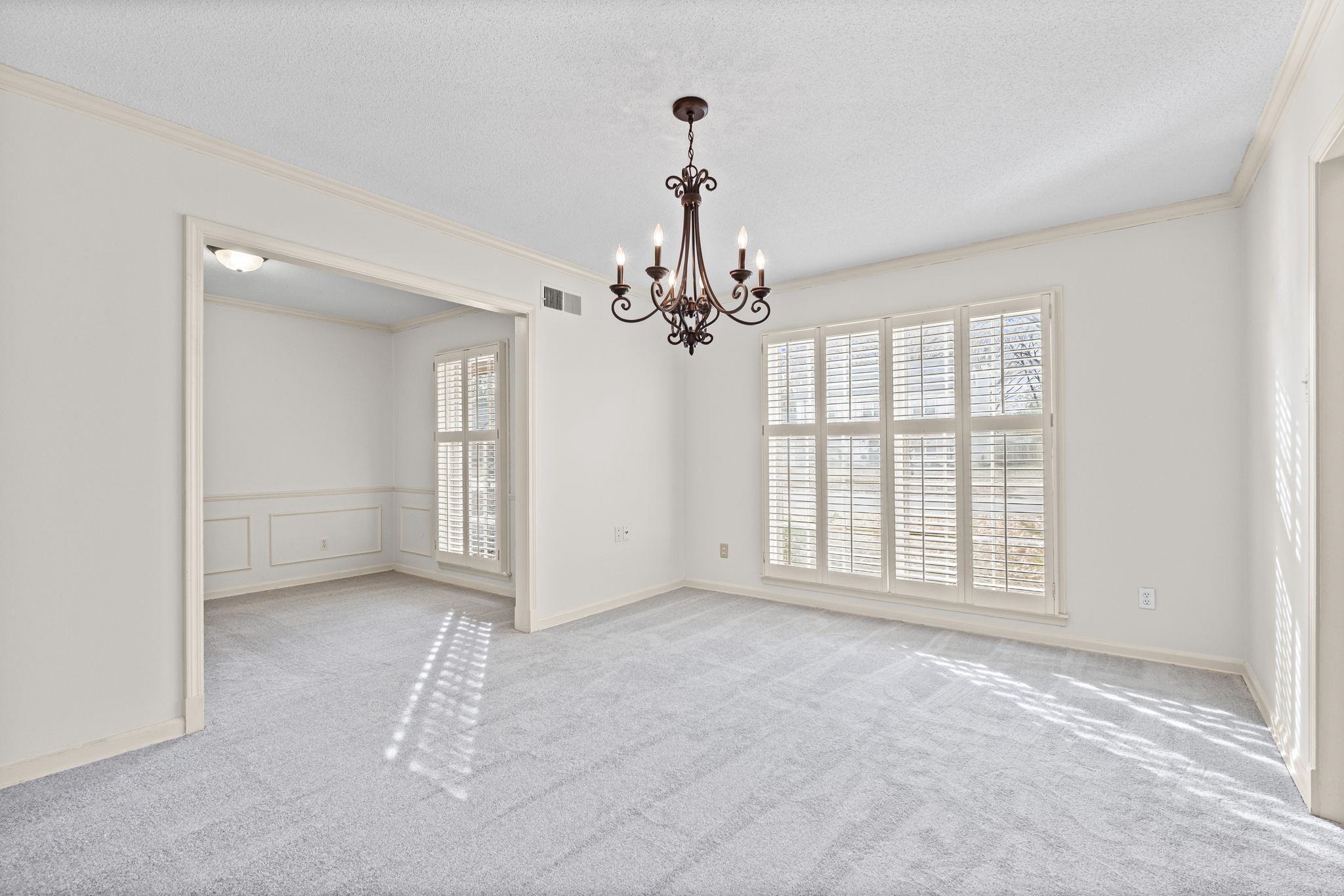 2432 Hawkhurst Street Memphis, TN 38119 - Photo 4 of 31 a view of an empty room with a window