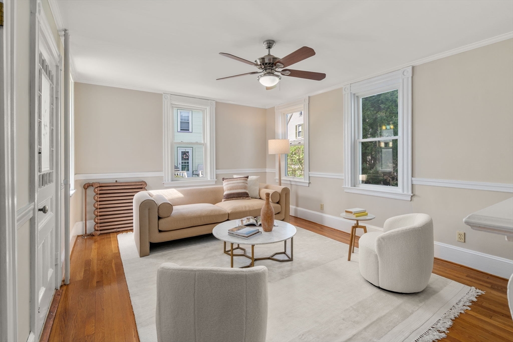 110 Mt Vernon Street Dedham, MA 02026 - Photo 11 of 35 a living room with furniture and a large window