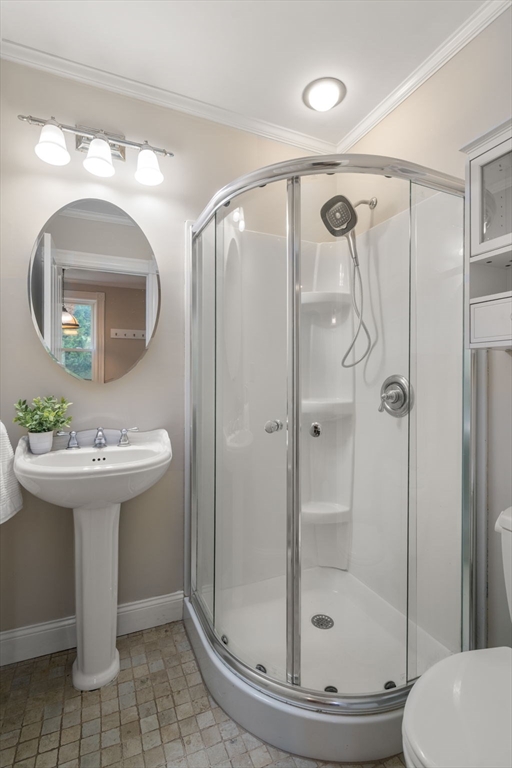 110 Mt Vernon Street Dedham, MA 02026 - Photo 13 of 35 a bathroom with a sink toilet and shower