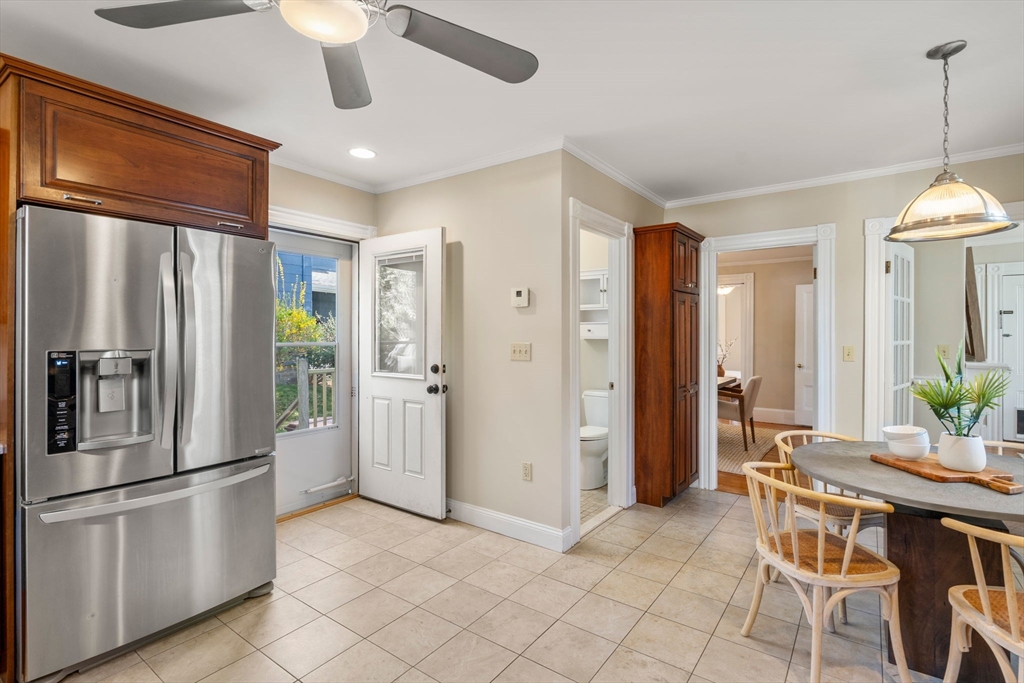 110 Mt Vernon Street Dedham, MA 02026 - Photo 17 of 35 a kitchen with stainless steel appliances granite countertop a refrigerator and a stove top oven