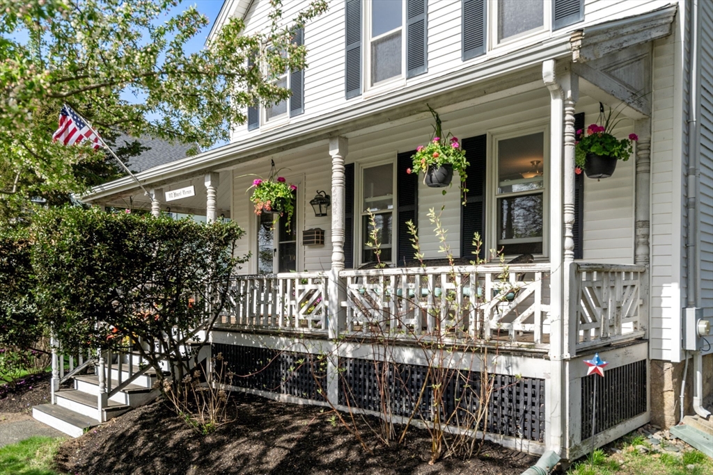 110 Mt Vernon Street Dedham, MA 02026 - Photo 3 of 35 front view of a house with a porch