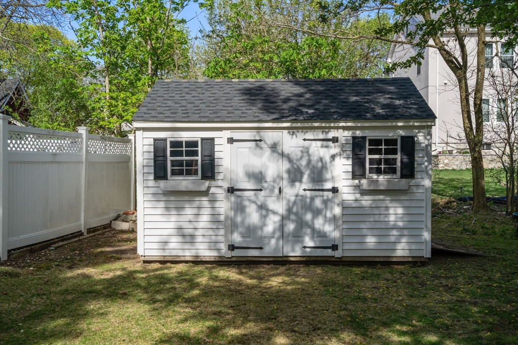 110 Mt Vernon Street Dedham, MA 02026 - Photo 33 of 35 a view of a house with a yard