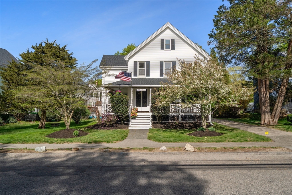 110 Mt Vernon Street Dedham, MA 02026 - Photo 4 of 35 a front view of a house with a yard