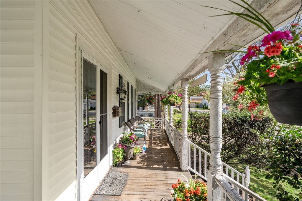 110 Mt Vernon Street Dedham, MA 02026 - Photo 5 of 35 a view of a balcony with flower potted plant