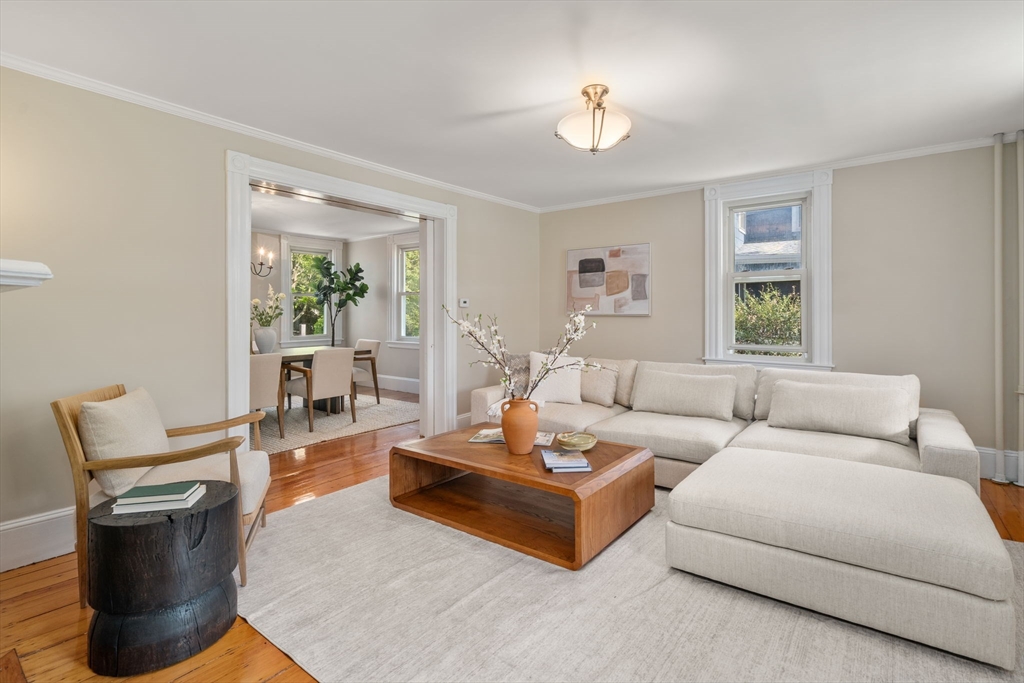 110 Mt Vernon Street Dedham, MA 02026 - Photo 7 of 35 a living room with furniture and a window
