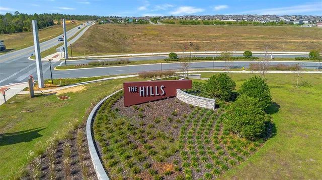 a view of a swimming pool with a lake view