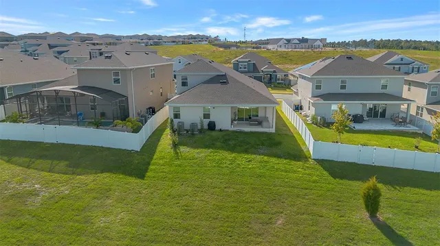 a view of a house with a swimming pool