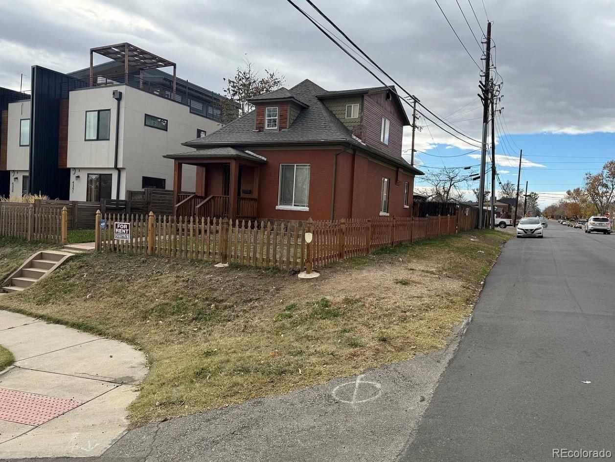 4353 Kalamath Street Denver, CO 80211 - Photo 2 of 28 a view of a house with a yard