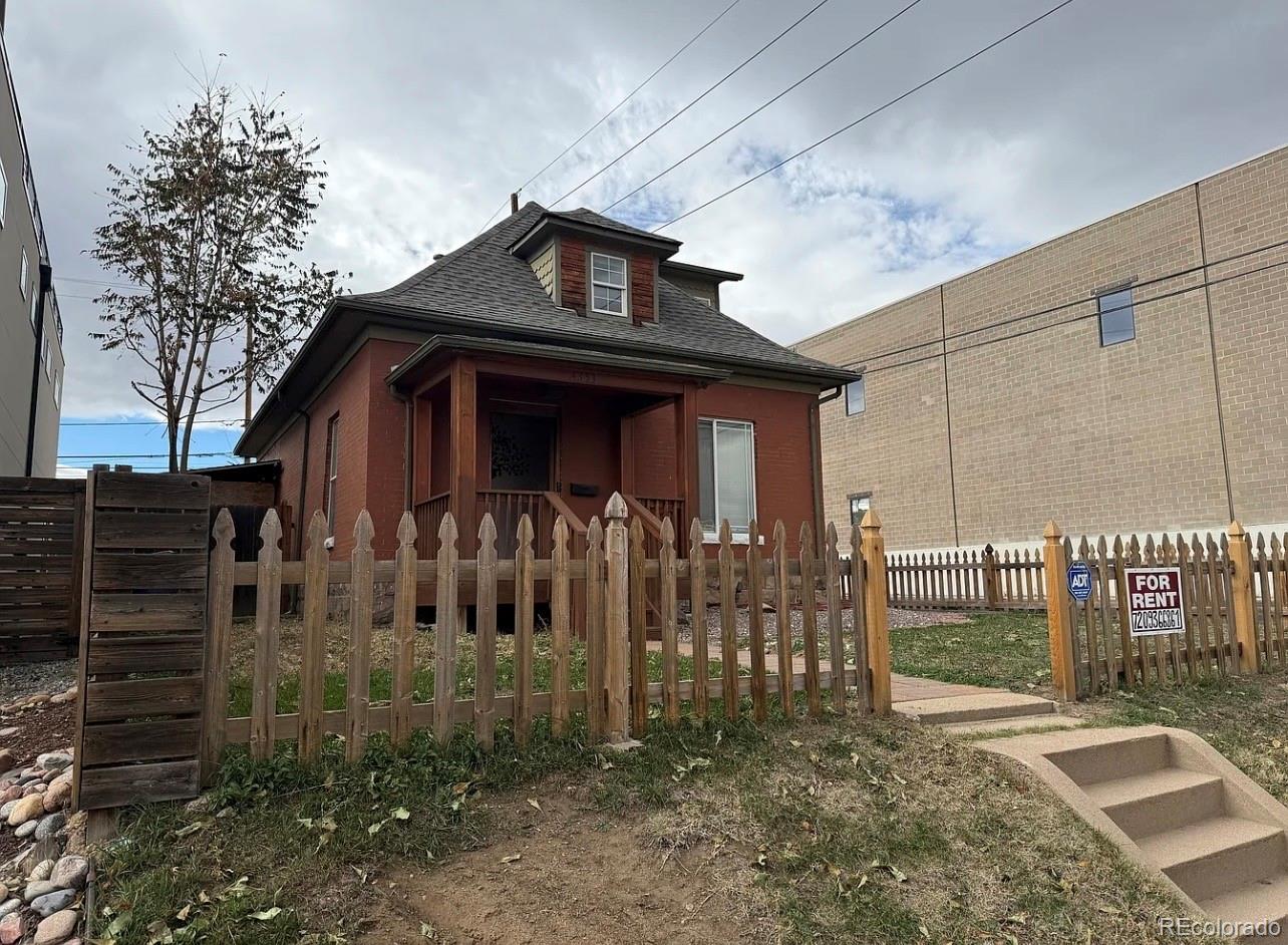 4353 Kalamath Street Denver, CO 80211 - Photo 3 of 28 a front view of a house with parking space