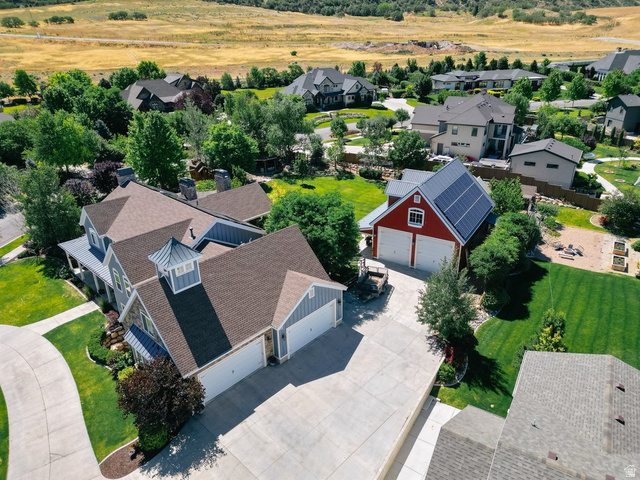 672 Perry Hollow Drive Mapleton, UT 84664 - Photo 15 of 106 Spacious property featuring a main residence with a large front porch and an attached multi-car garage