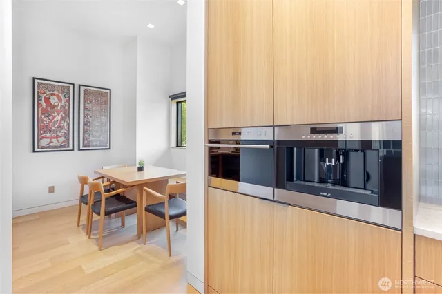 a room with furniture a window and a flat screen tv