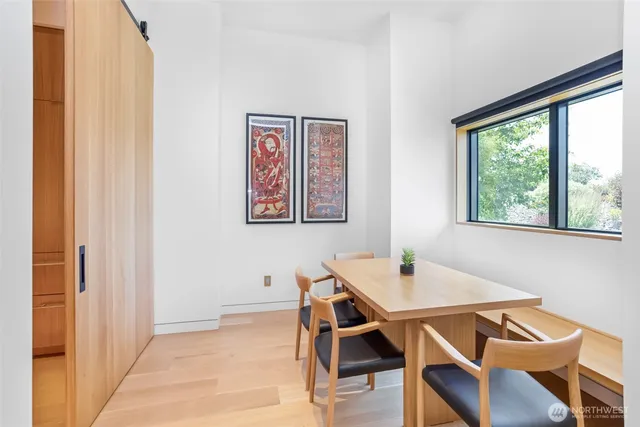 a workspace with furniture and window