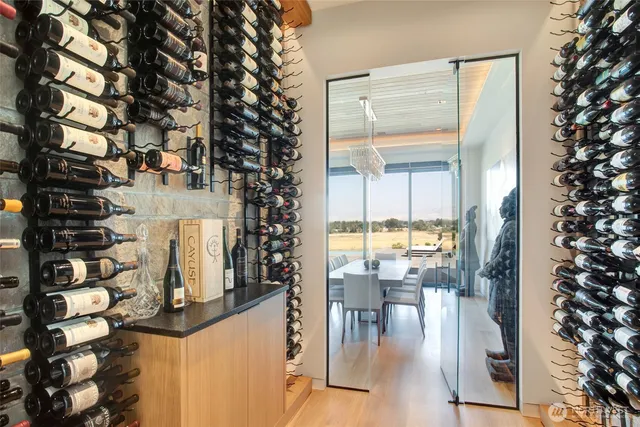 a view of living room with furniture and wooden floor