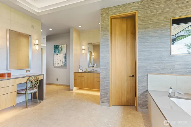 a view of a bathroom with tub shower