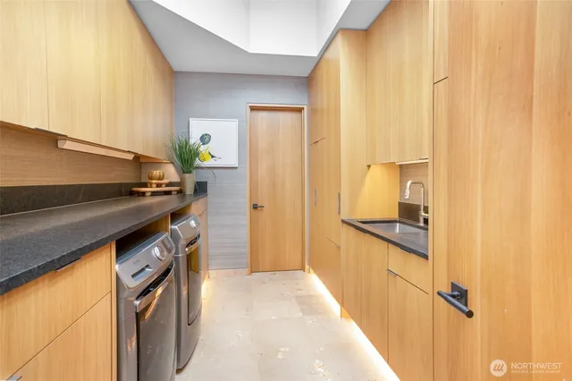 a kitchen with a stove and a refrigerator