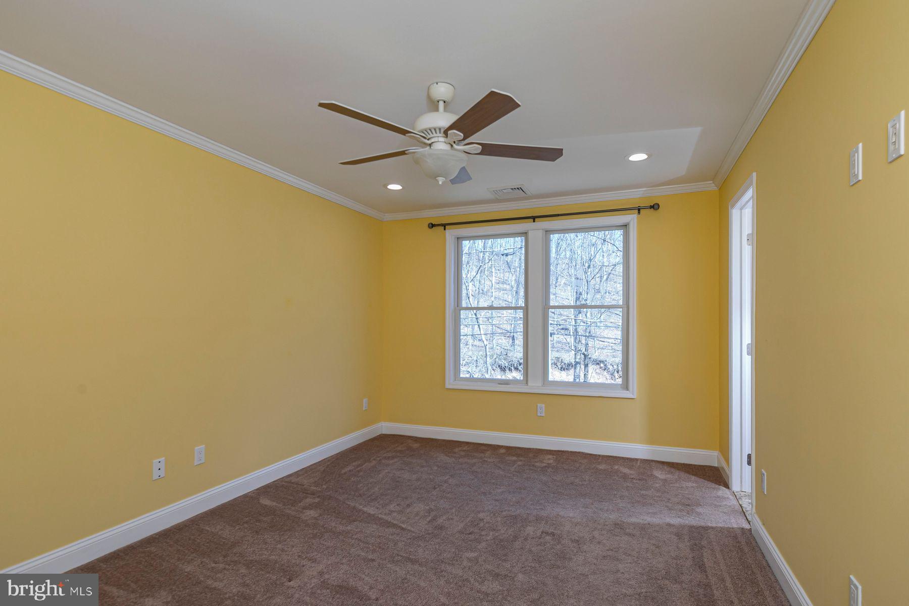 310 Hollow Road Skillman, NJ 08558 - Photo 22 of 32 a view of an empty room with a window