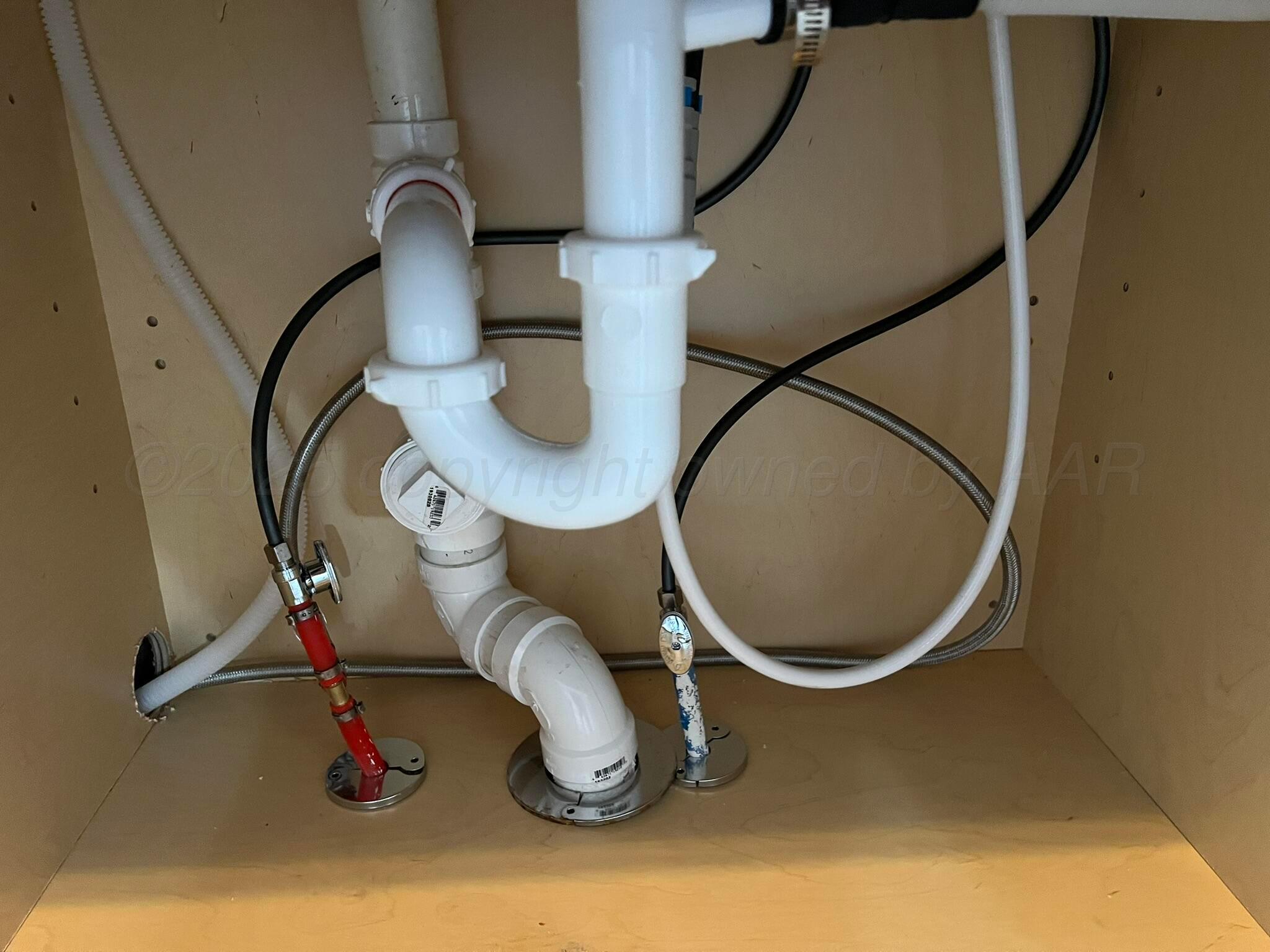 817 South 6th Street Memphis, TX 79245 - Photo 19 of 43 a picture of water heater and living room