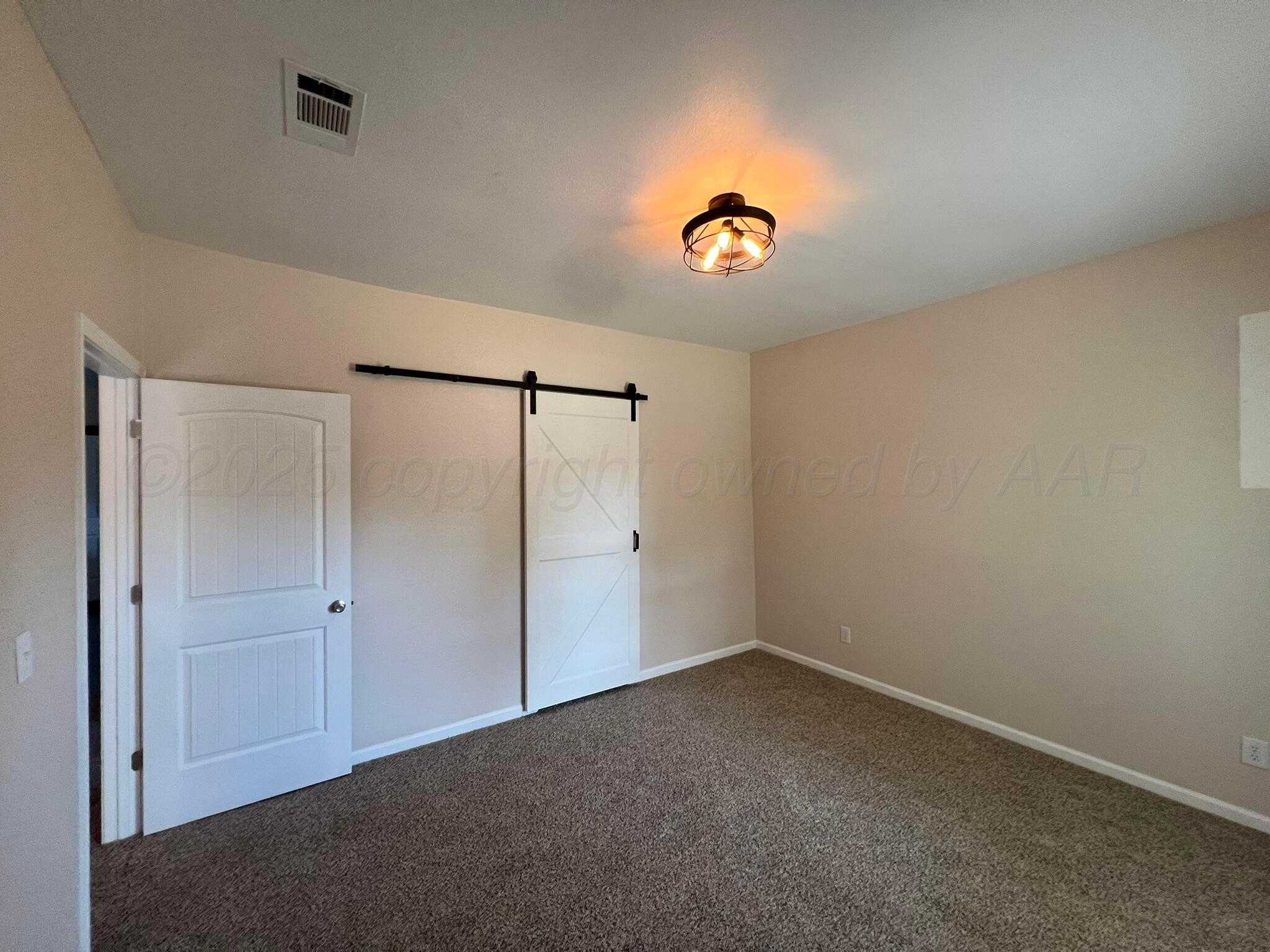 817 South 6th Street Memphis, TX 79245 - Photo 21 of 43 an empty room with a window