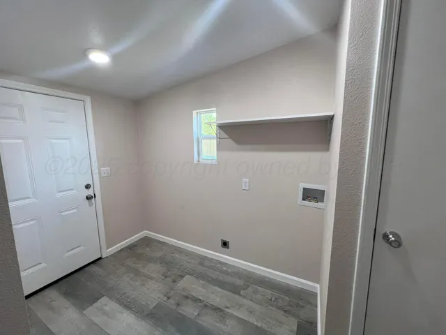 a backyard of a house with seating space