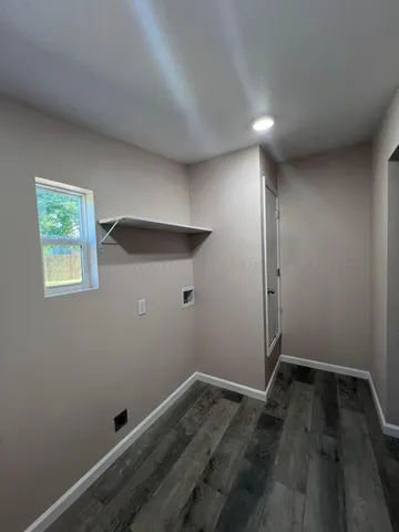 a view of a yard with large trees