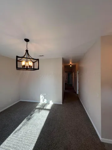 a very nice looking room with a ceiling fan