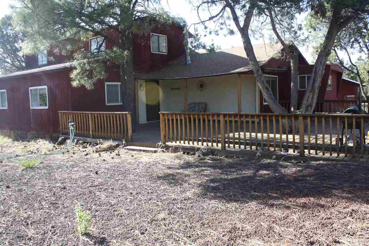 5298 Show Low Lake Road Lakeside, AZ 85929 - Photo 32 of 36 a front view of a house with a yard