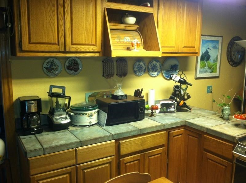 5298 Show Low Lake Road Lakeside, AZ 85929 - Photo 10 of 36 a kitchen with sink and a wooden cabinets