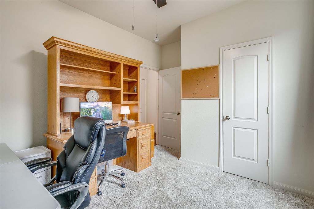 136 Kennedy Drive Venus, TX 76084 - Photo 15 of 27 a view of a workspace with furniture and a window