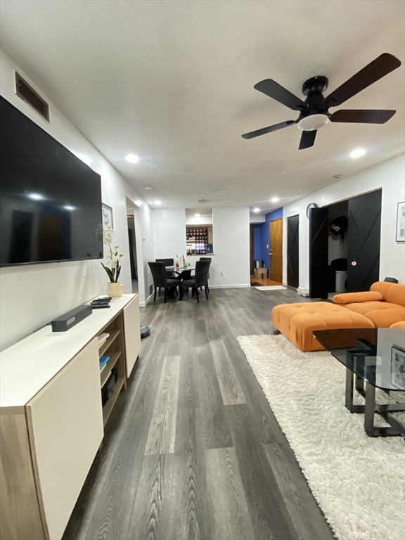 a large kitchen with stainless steel appliances kitchen island a large island in the center