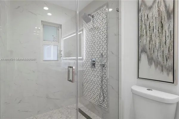 a bathroom with a shower curtain