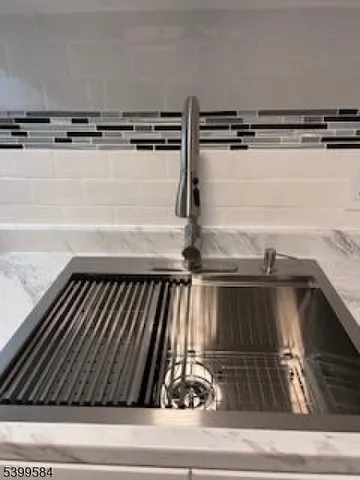a utility room with wooden floor