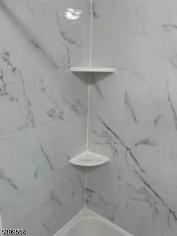 a bathroom with a sink and a shower