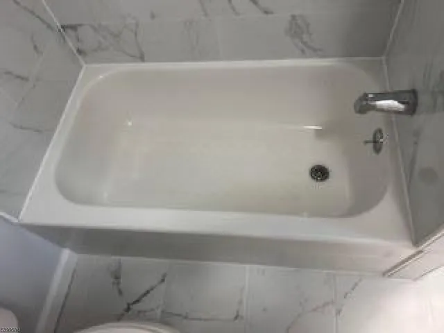 a bathroom with a bathtub