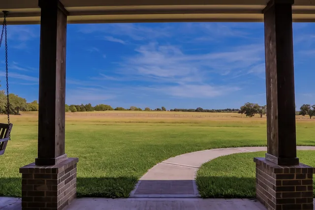 a view of a living room and workspace
