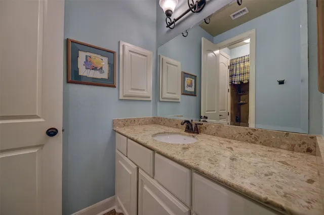 a room with furniture and a flat screen tv