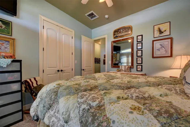 a bathroom with a sink a mirror and a toilet