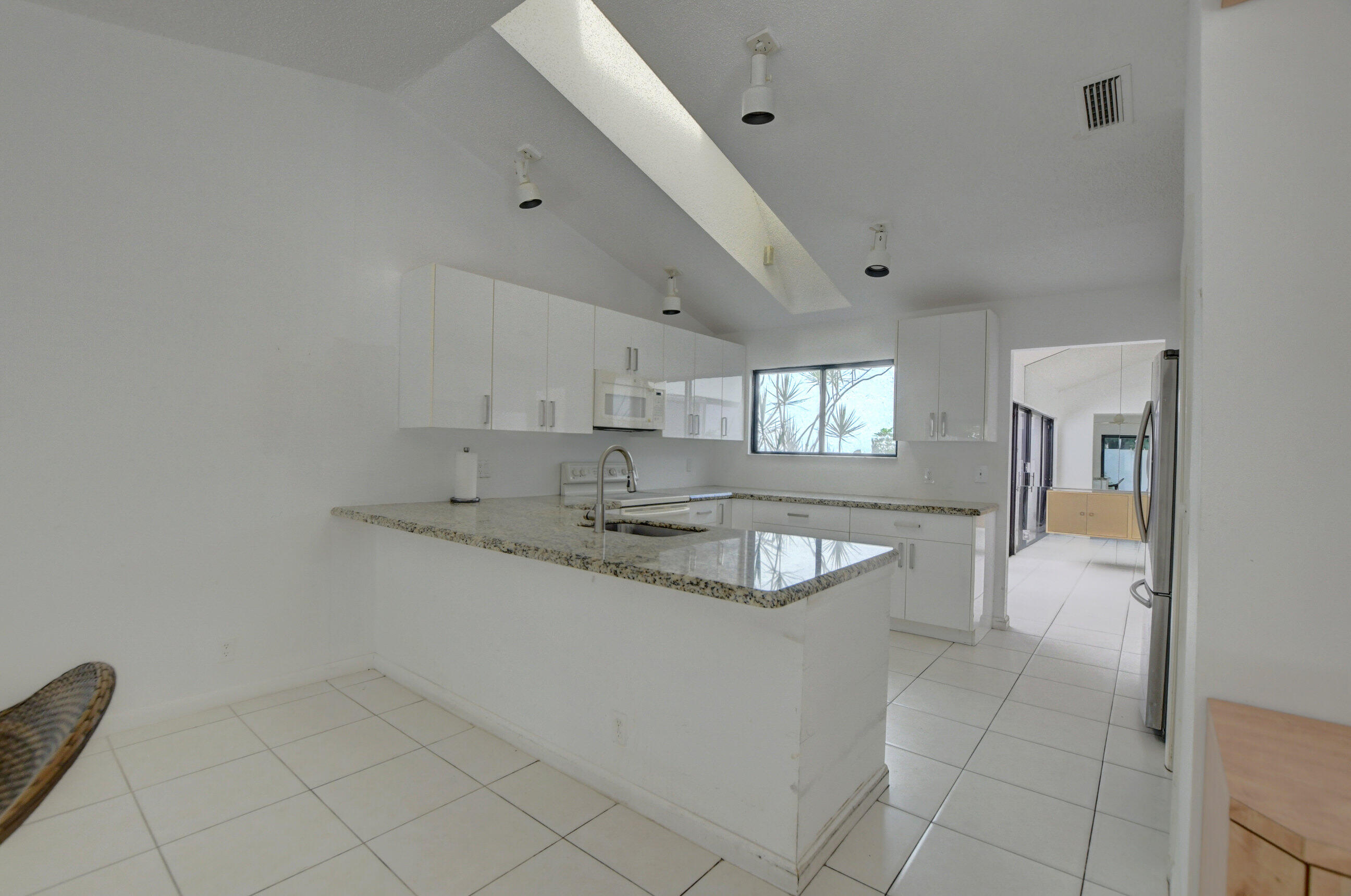 7374 Woodmont Court Boca Raton, FL 33434 - Photo 10 of 42 14_ebf_0066_67_68_69_70