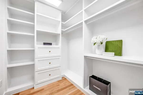 a view of room with cabinets and window