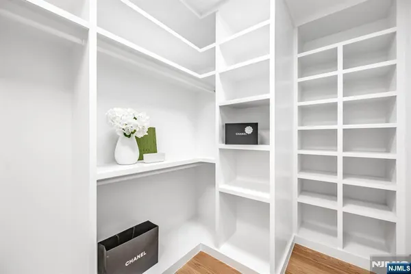 a spacious bathroom with a double vanity sink mirror and