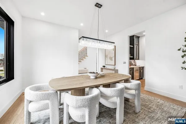 a kitchen with stainless steel appliances a sink and cabinets