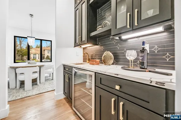 a kitchen with a table and chairs in it